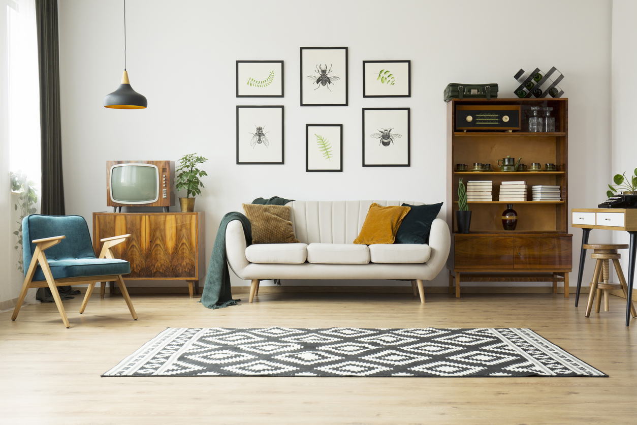 vintage tv next to couch