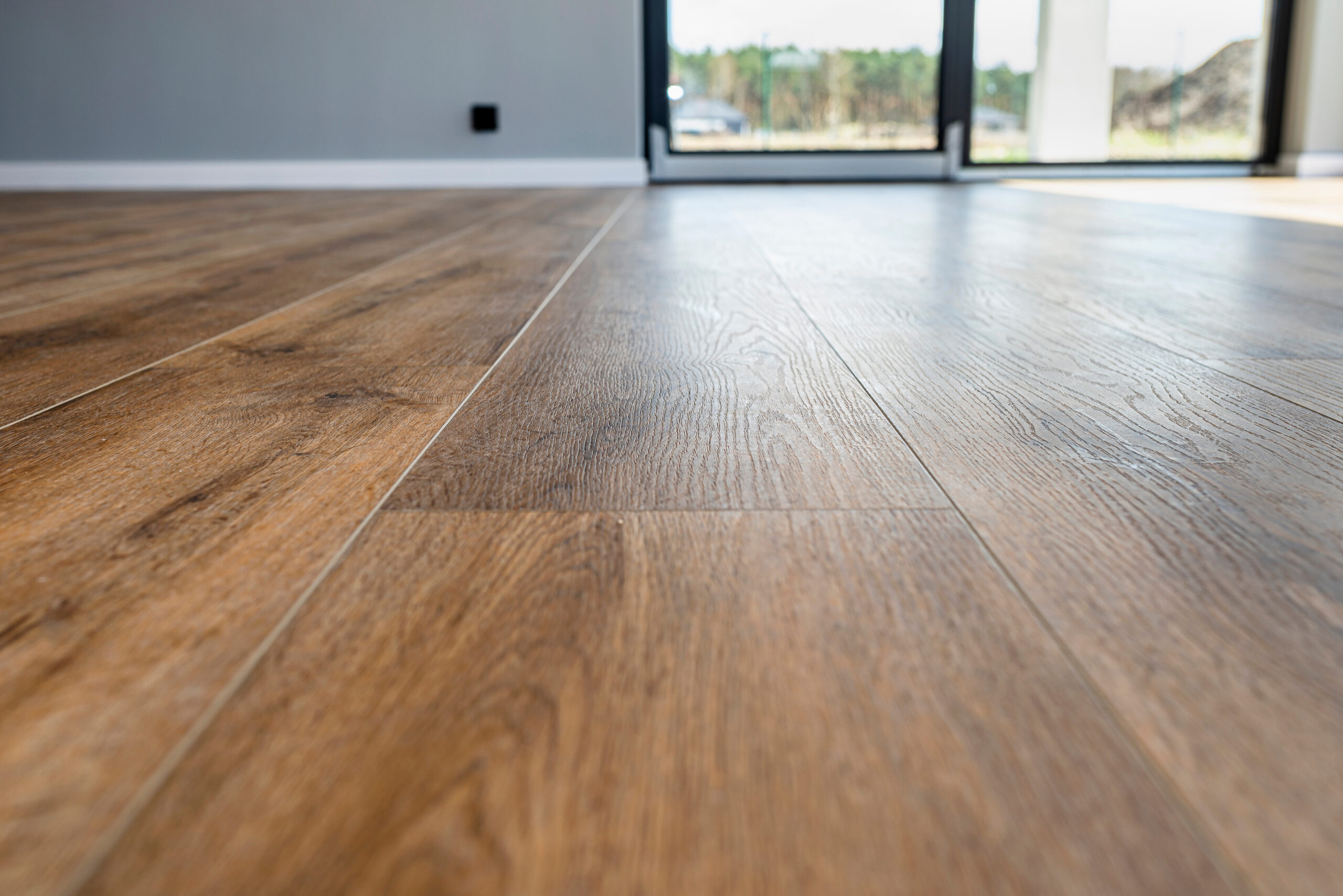 Wood-look vinyl plank flooring in a sunlit living room